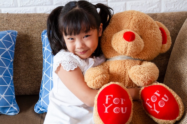 cute girl with teddy bear