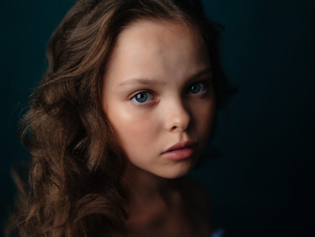 Premium Photo | Little girl face closeup makeup studio posing