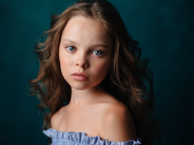 Premium Photo | Little girl face closeup makeup studio posing