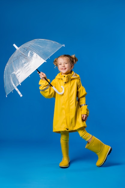 little girl umbrella and boots