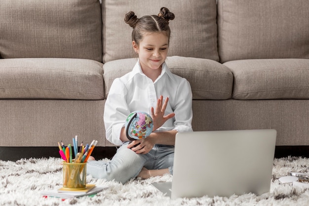 Little girl starting an online class | Free Photo