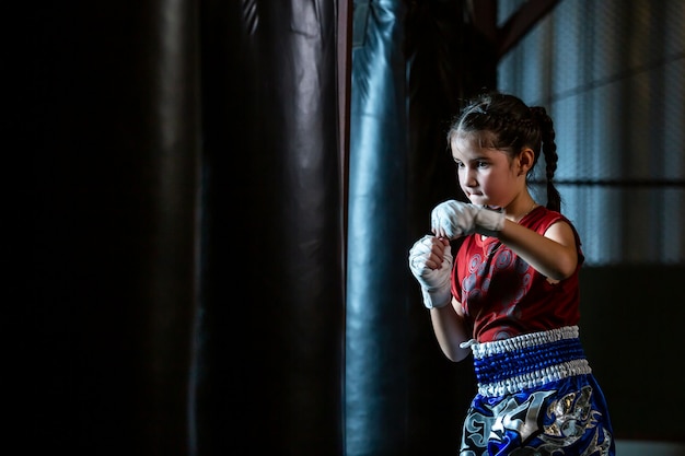 Premium Photo Little Girl Thai Boxing Training Is A Self Defense Course Muay Thai