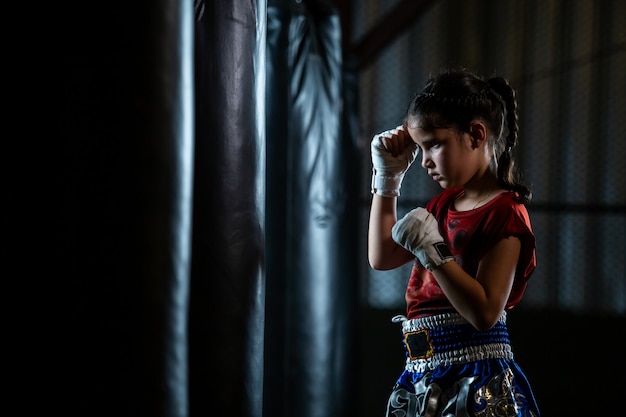 Premium Photo Little Girl Thai Boxing Training Is A Self Defense Course Muay Thai