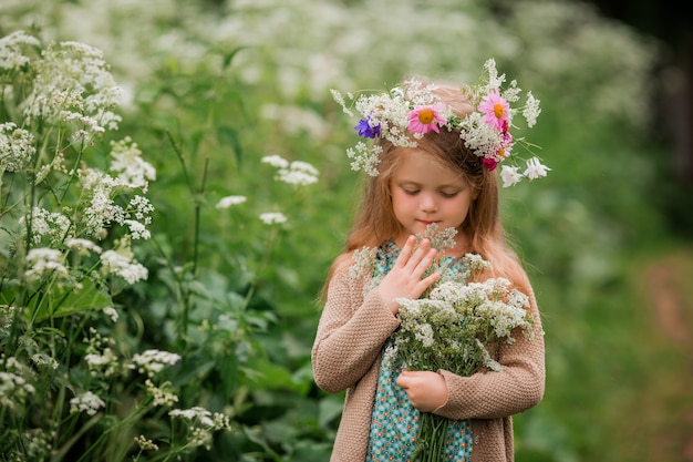 little-girl-with-a-wreath-of-flowers-on-