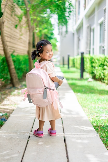 little girl with backpack