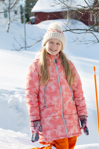 Premium Photo | Little norwegian girl smiling. fun winter. norway