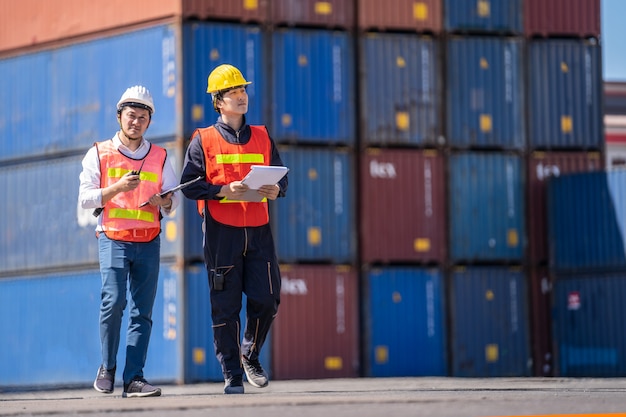 Premium Photo | Logistics engineer control at the port, loading ...