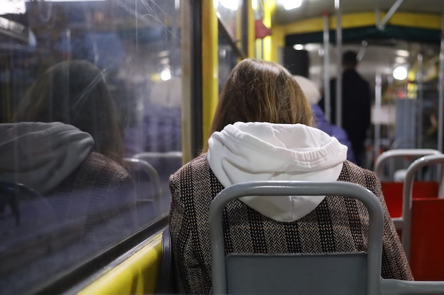 Premium Photo | Lonely girl passenger in public transport trams in the ...