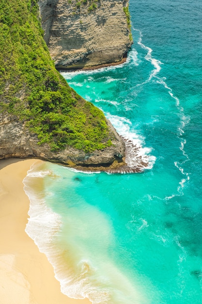 Premium Photo | Lonely sand beach rocks turquoise blue sea water