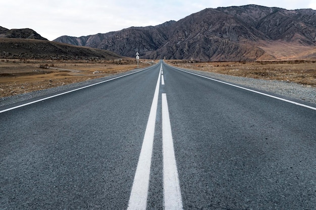 Premium Photo | Long road stretching out into the distance