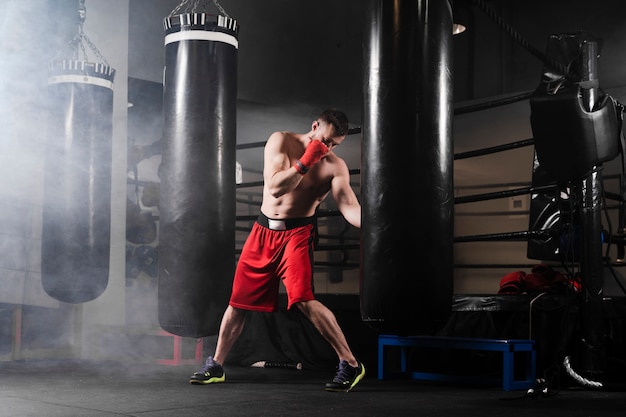 Premium Photo Long Shot Man Training For Boxing Competition