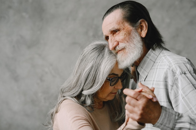 Free Photo Love Never Grows Old Joyful Active Old Retired Romantic Couple Dancing In Living Room