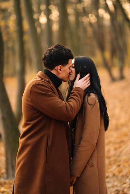 Premium Photo Lovely Couple Walking In The Autumn Forest