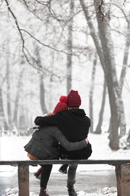 Free Photo | Lovely couple warming each other with a hug