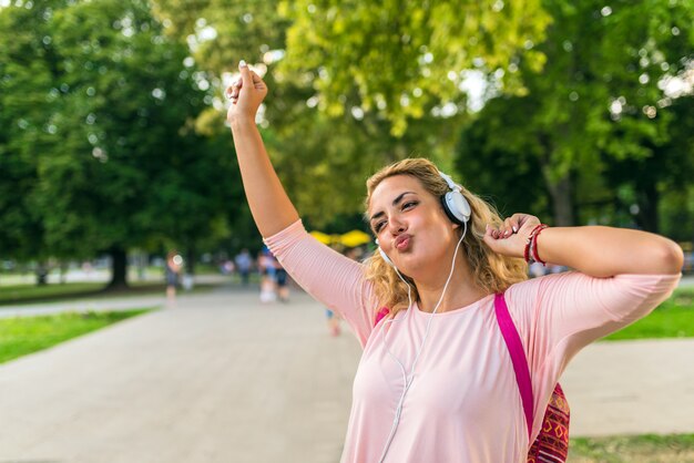 Premium Photo | Lovely girl with headphones enjoying her time