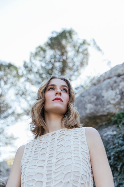 Low Angle Shot Young Woman Face Free Photo