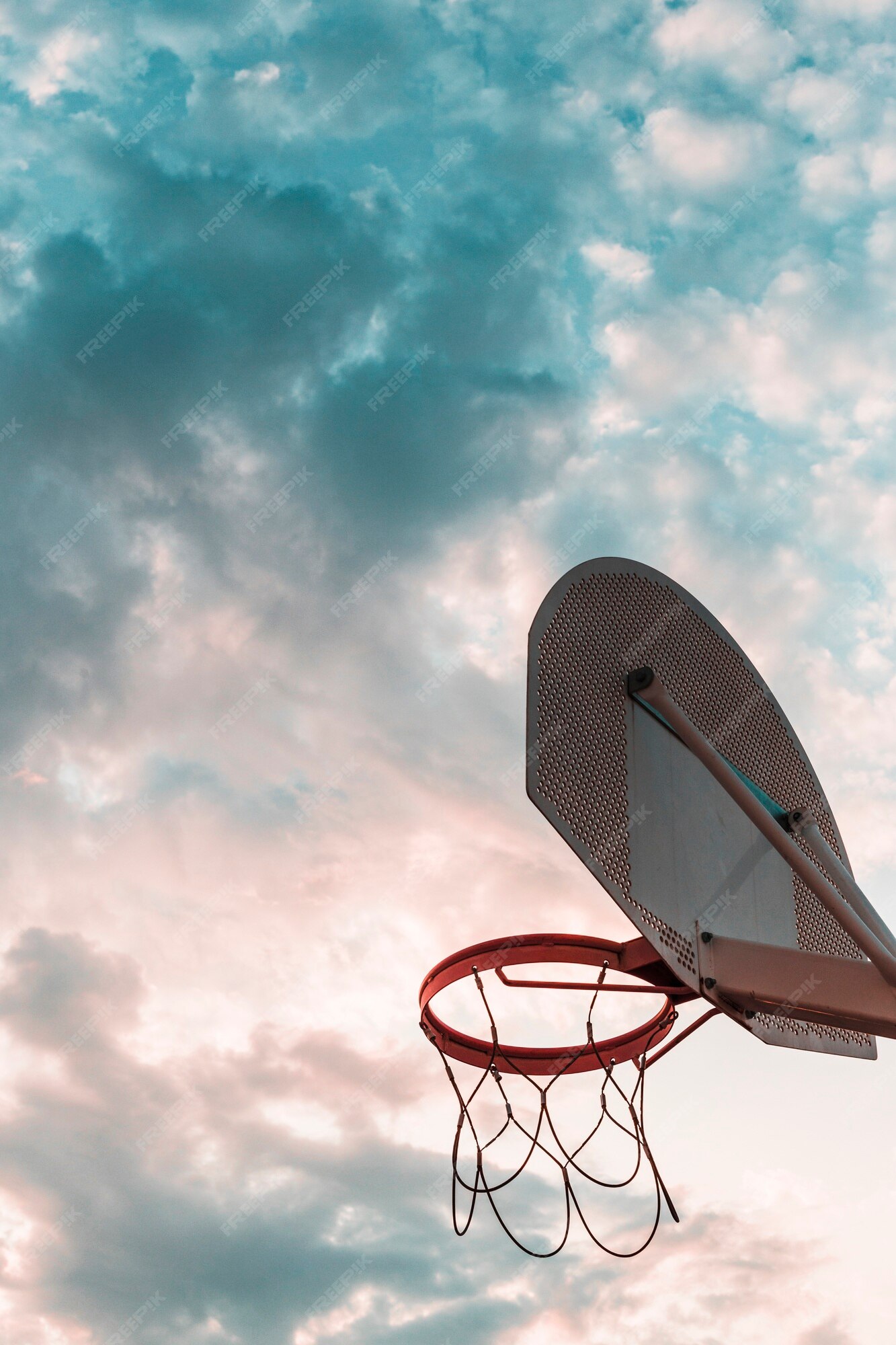 Free Photo | Low angle view of basketball hoop against cloudy sky