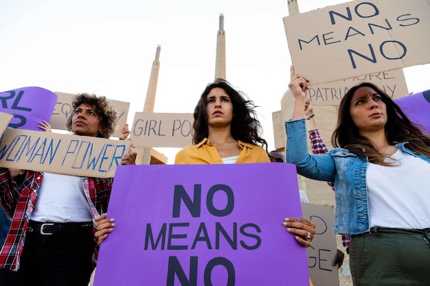 Premium Photo | Low angle view of multi-ethnic women activists ...