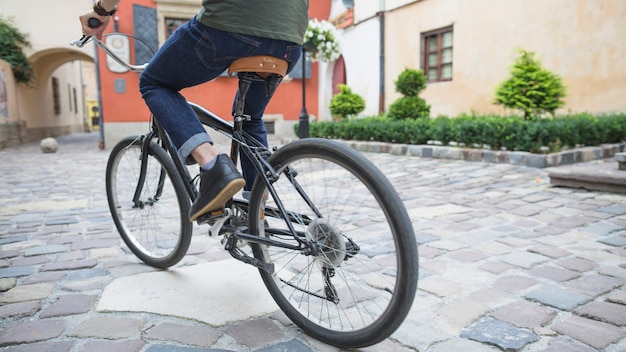 riding mountain bike on pavement