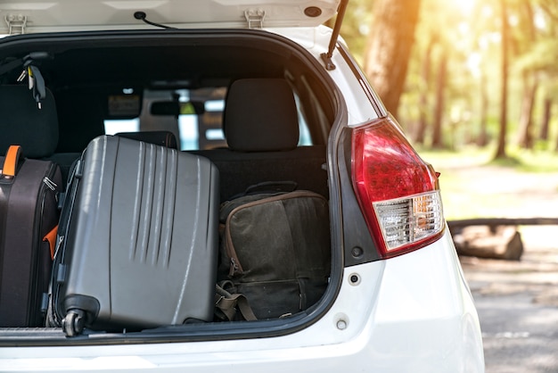 Premium Photo | Luggage : car trunk with luggage. travel concept