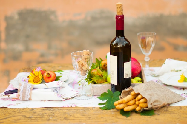 Premium Photo Lunch In The Garden With Wine And Fruit Romantic Dinner In The Open Air Autumn Leaves Of Flowers Beautiful Table Scrapbooking Vintage Photo