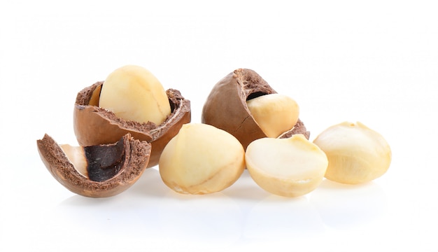 Premium Photo | Macadamia nuts isolated on white surface.