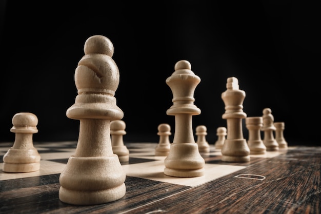 Premium Photo | Macro shot of wooden chess figures on chess board