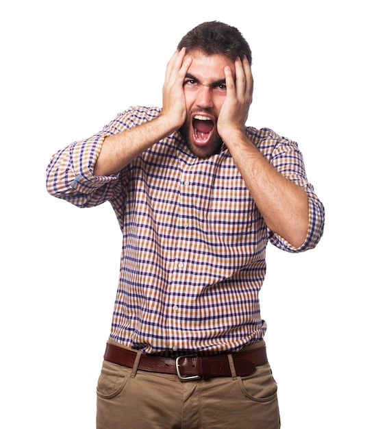 Mad shouting man with hands around his head Photo | Free Download