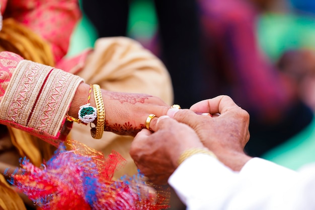 Premium Photo | Maharashtra wedding ceremony in hinduism groom putting ...