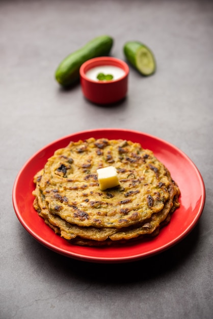 Premium Photo | Maharashtrian kakdi thalipeeth or punjabi cucumber ...