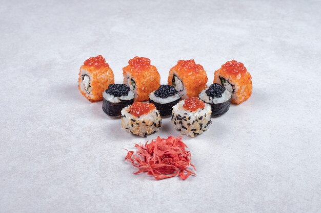 Free Photo Maki Alaska And California Sushi Rolls On White Background With Pickled Ginger