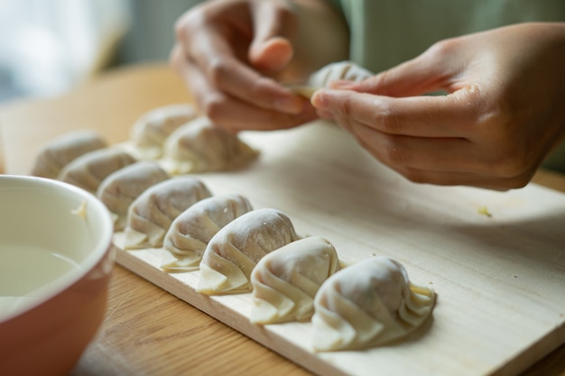 Premium Photo | Making chinese style dumplings homemade