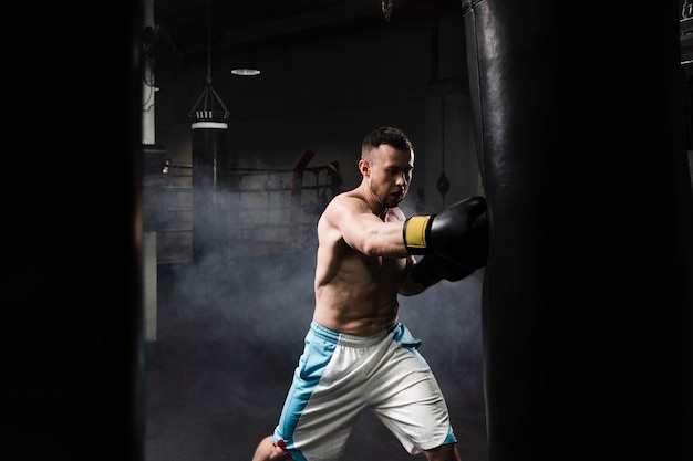 Free Photo | Male boxer training for a competition