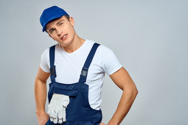 Male builder in special clothes builder and call repair | Premium Photo