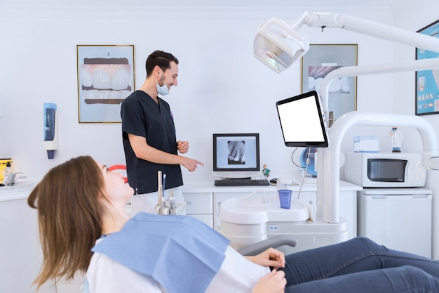 Dentist using a dental imaging software