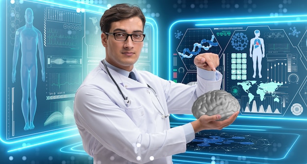 Male doctor holding a brain Premium Photo