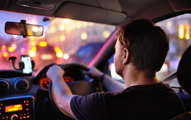 male driver ride car during evening traffic jam 107864 1462 - Bingung Akses Dari dan Ke Bandara Kuala Lumpur? Simak Solusinya!