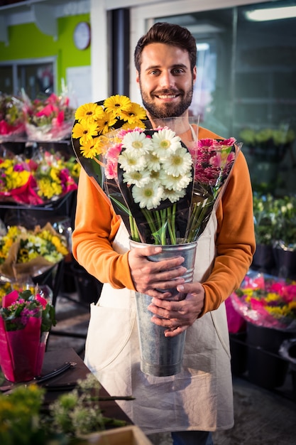 Premium Photo Male Florist Holding Flower Bouquet At Flower Shop