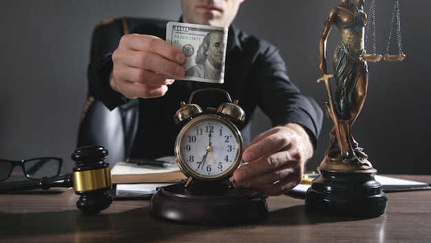 Premium Photo | Male judge holding clock and money at courtroom.