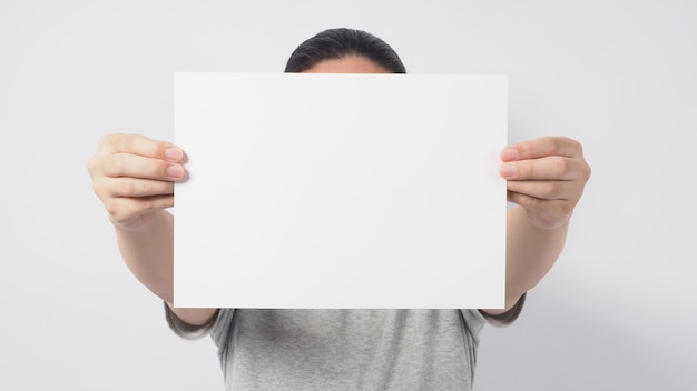 Premium Photo | Male model's hands is holding the a4 paper and wear ...