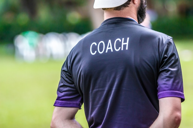 Premium Photo | Male soccer or football coach standing on the sideline ...