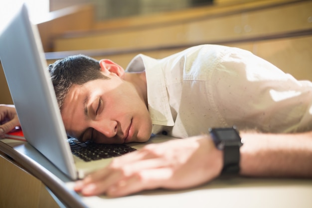 premium-photo-male-student-falling-asleep-during-class-at-the-university