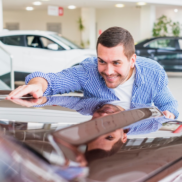 Free Photo Man Checking Out New Car