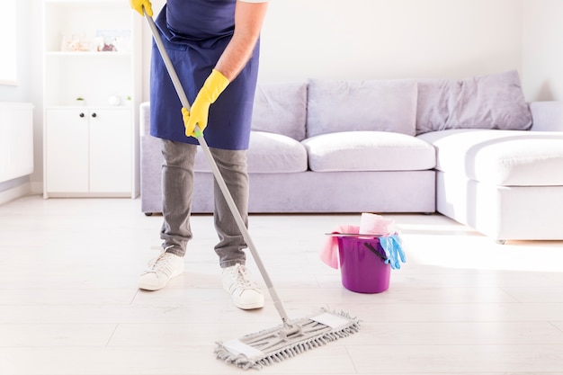 Man cleaning his home Free Photo