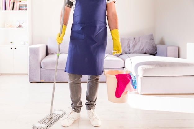 Free Photo | Man cleaning his home