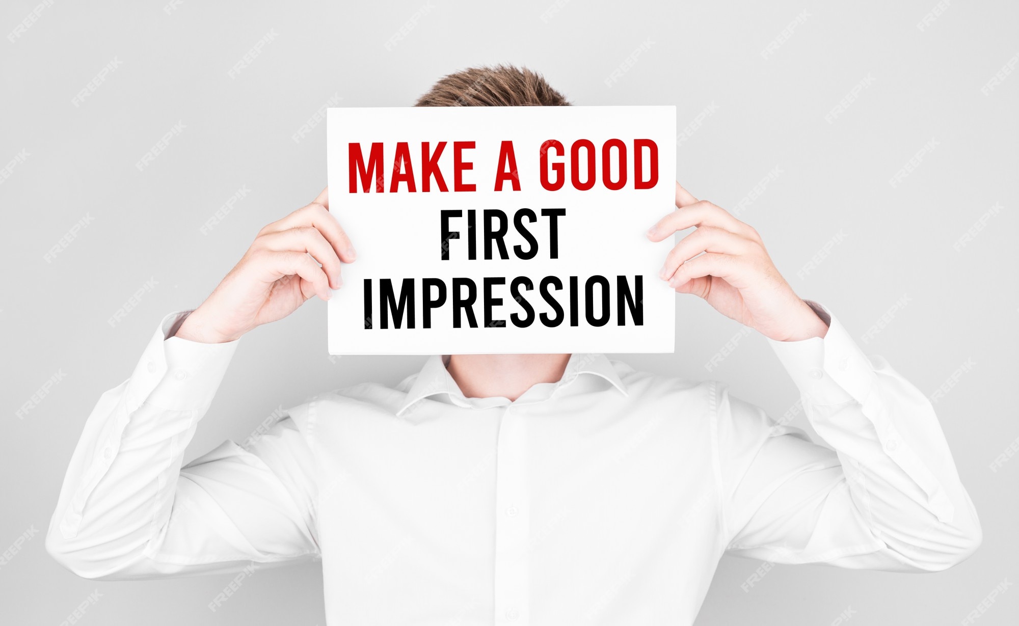 How To Make Good First Impression On A Guy Premium Photo | Man covers his face with a white paper with text make a