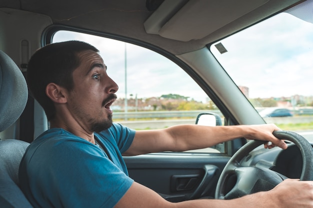 Premium Photo | Man driving car scared before accident driving accident ...