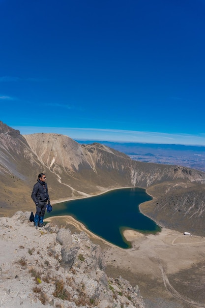 Premium Photo A Man On The Edge Of The Cliff In The Nevado De Toluca