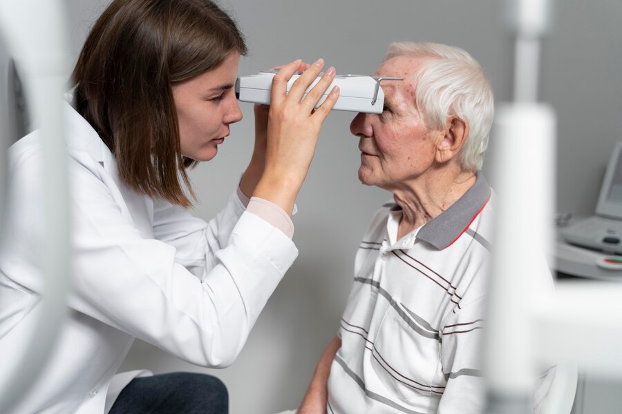 Free Photo | Man having an eye sight check