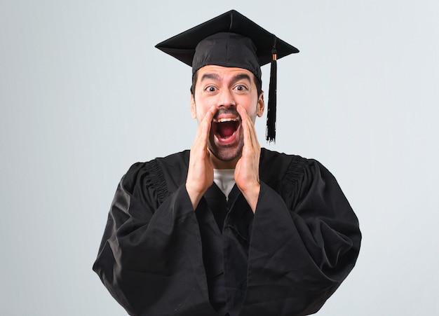 Premium Photo | Man on his graduation day university shouting with ...